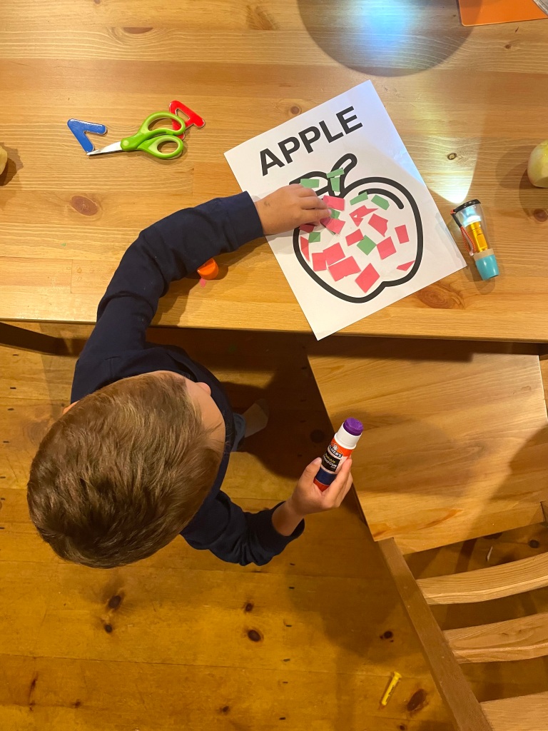 Easy preschool scissor skills apple activity.